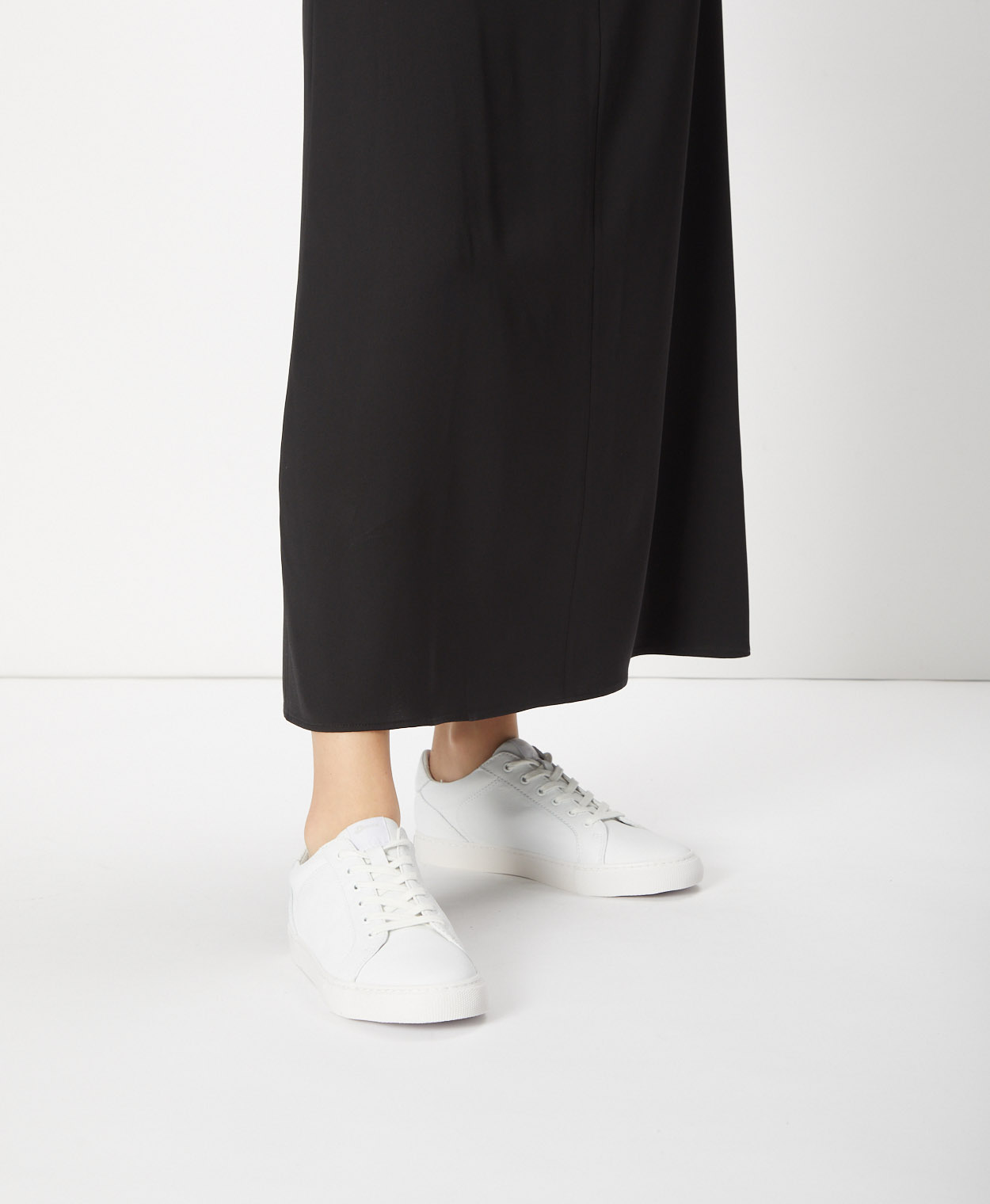 Wide white hotsell leather sneakers